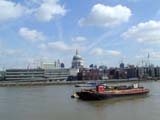 Boat crossing Thames in front of St Paul's Cathedral (84 kbytes) - Click to enlarge